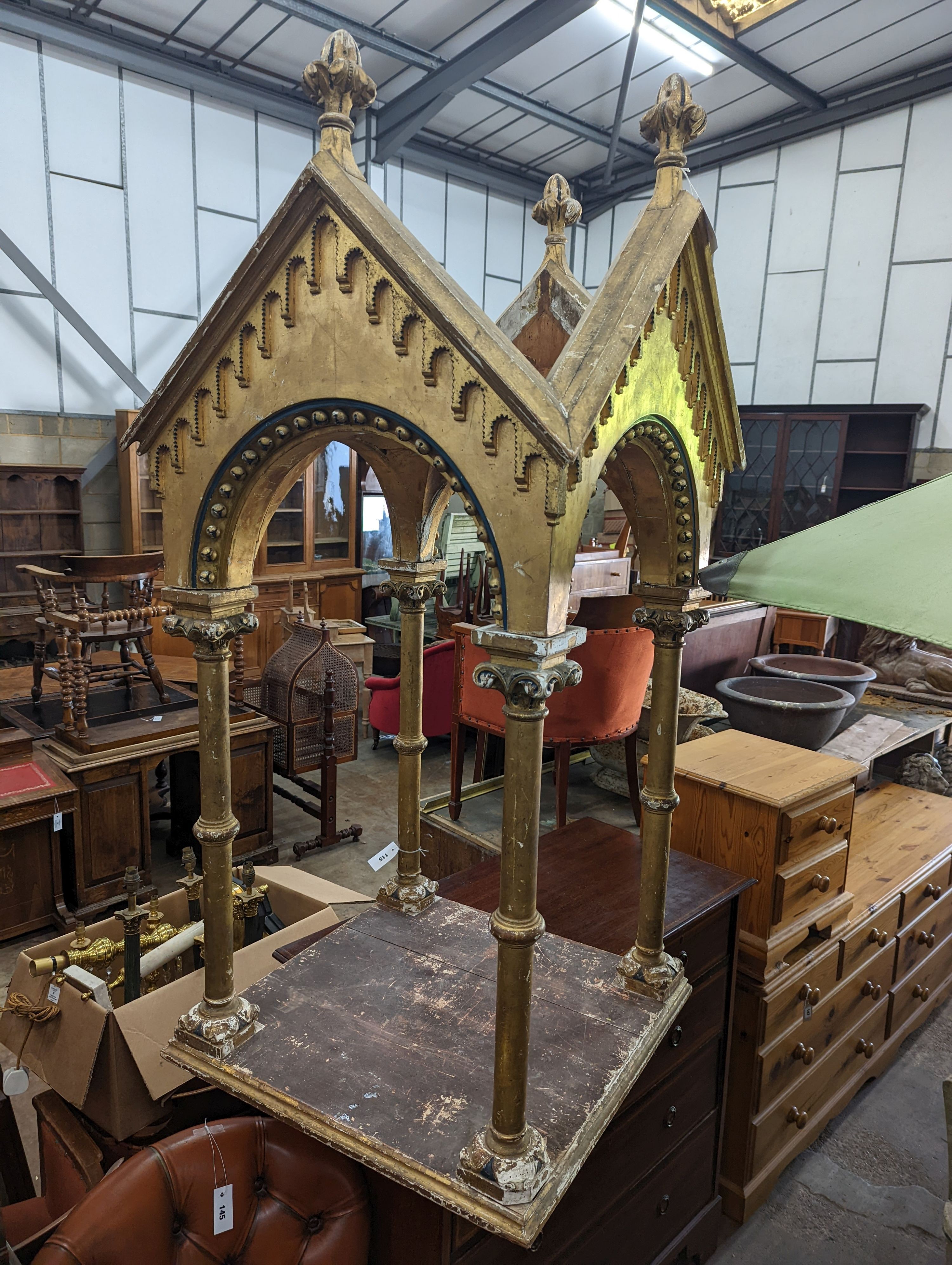 A Victorian carved giltwood and gesso shrine, width 68cm, depth 69cm, height 150cm